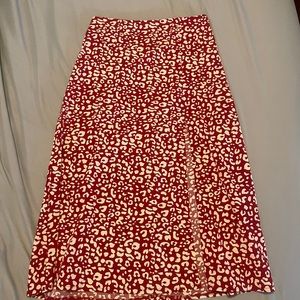 red and tan cheetah skirt with slit size medium/large